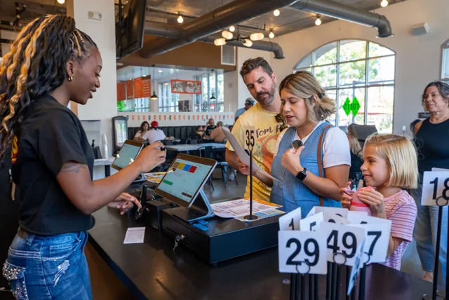 Customers ordering at the Shooby’s counter